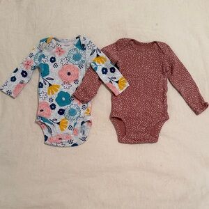 Pair of long sleeved Carter’s Bodysuits